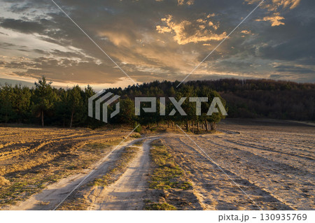 Sunset over a sustainable landscape showcasing conservation efforts in a changing climate 130935769