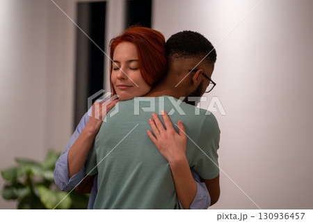 Black guy and girl hugging moment of strong feelings of love and friendship. Loving couple 130936457