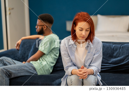 Unhappy interracial couple wife and husband not talking, going through marital crisis 130936485