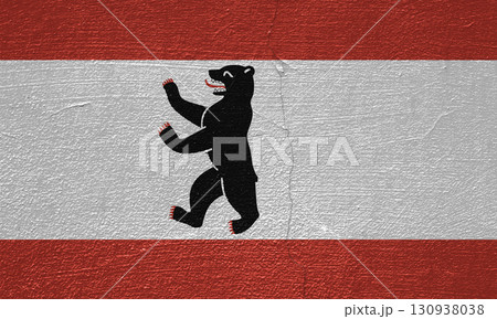 The official flag of Germany's capital, Berlin, on the texture of a cracked wall. Conceptual collage 130938038