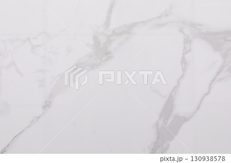 Elegant white marble surface with gray veining suitable for various design projects 130938578