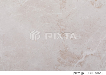 Light beige marble surface showcasing natural patterns and textures for interior design projects and 130938645