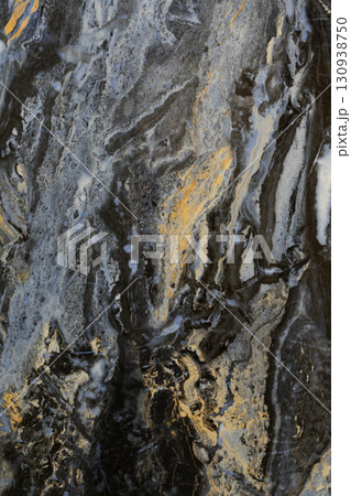 Beautiful black and gold marble with intricate patterns and textures for elegant interior design 130938750