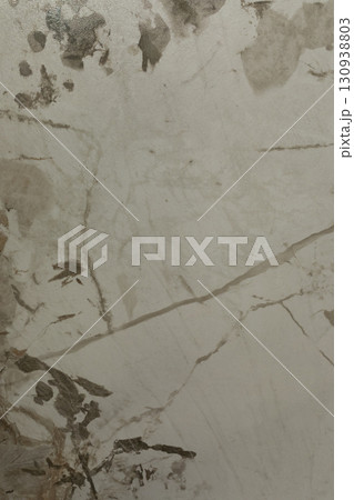 Marble surface showing natural patterns and textures in neutral tones and colors 130938803