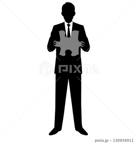 パズルピースを持つ男性ビジネスマン 130938911