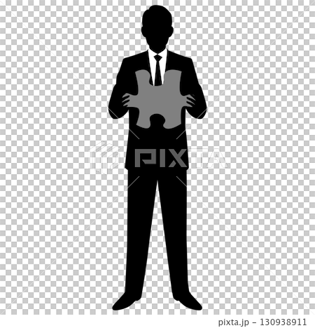 パズルピースを持つ男性ビジネスマン 130938911