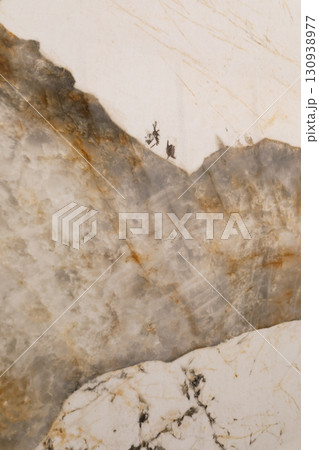 Unique marble with natural patterns resembling mountains and trees found in a modern interior Unique marble with natural patterns resembling mountains and trees found in a modern interior 130938977