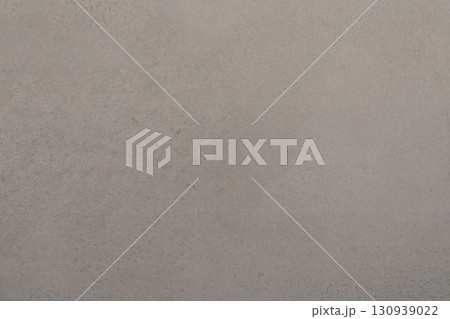 Smooth, light gray textured wall surface perfect for modern decor and background settings Smooth, light gray textured wall surface perfect for modern decor and background settings 130939022
