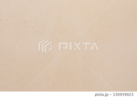 Smooth sandy texture with subtle variations in color and pattern showcasing a neutral background in 130939023