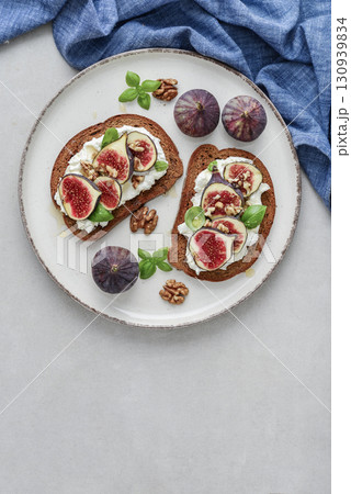 Sandwiches with figs, cream cheese, basil and honey Sandwiches with figs, cream cheese, basil and honey 130939834