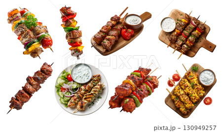 Set of Shish tikka meat vegetable grilled kebab kebob skewers, chicken lamb beef pork, serving wooden board, with sauce, plate, pile stack on transparent cutout PNG. Mockup template 130949257