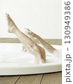 woman legs in bathtub 130949386