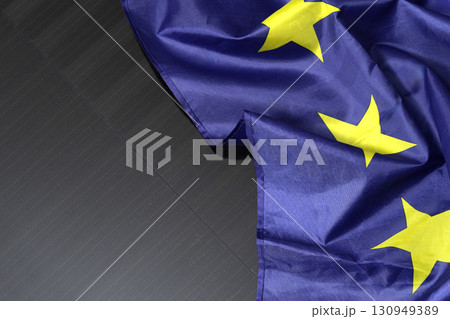 European Union flag placed on solar panel European Union flag placed on solar panel 130949389