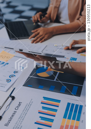 Professional Executive business team brainstorming on meeting to planning investment project working and strategy of business making conversation with partner and consultation of collaboration 130950213