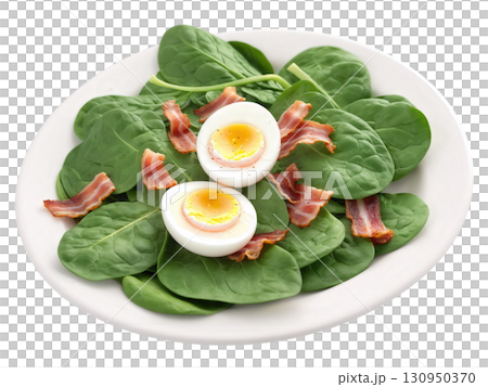 Spinach Salad Fresh spinach leaves topped with red onions, hard-boiled eggs, crumbled bacon, and a warm bacon dressing. The spinach 130950370