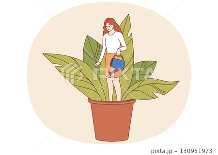 Woman engaged in self-development and personality improvement, standing in flower pot, field soil Woman engaged in self-development and personality improvement, standing in flower pot, field soil 130951973