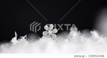 natural snowflakes on snow. the picture is made at a temperature of-10 C  130952488
