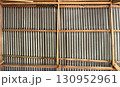 Corrugated metal roof with wooden framework and rustic design 130952961