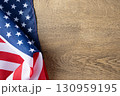 Background for Memorial Day posters, Veterans Day banners, and patriotic holiday designs. American flag on wooden background with copy space. 130959195