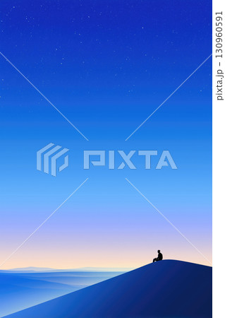 Silhouette of a person contemplating nature under a starry night sky 130960591