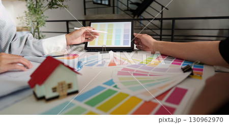Interior Design Consultation. Collaborating on color selections for a home project. Interior Design Consultation. Collaborating on color selections for a home project. 130962970