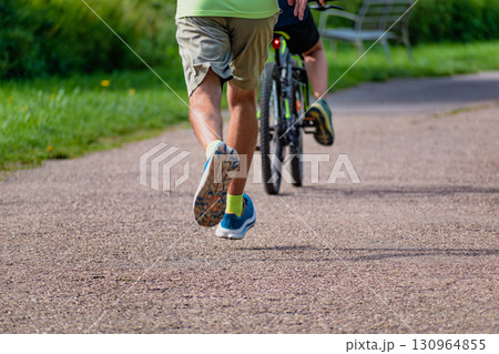 Man walking on a path, helathy activity to make exercice 130964855