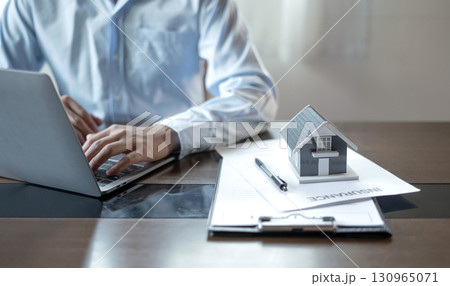 cagents working in real estate investment and home insurance signing contracts in accordance with the home buying insurance agreements approving purchases for clients cagents working in real estate investment and home insurance signing contracts in accordance with the home buying insurance agreements approving purchases for clients 130965071