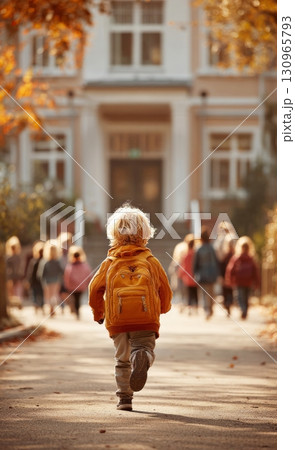 Child running to school on an autumn day, back to school concept Child running to school on an autumn day, back to school concept 130965793