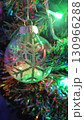 Christmas tree decorated with beautiful transparent ball with abstract snowflake 130966288
