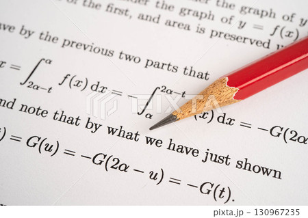 Pencil on mathematic formula exercise test paper in education school. Pencil on mathematic formula exercise test paper in education school. 130967235