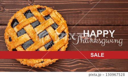 Thanksgiving pie sale celebration with a lattice crust and berry filling on wooden table 130967528