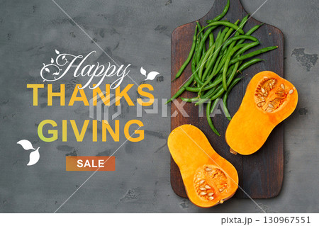 Seasonal sale features butternut squash and green beans for Thanksgiving celebration 130967551