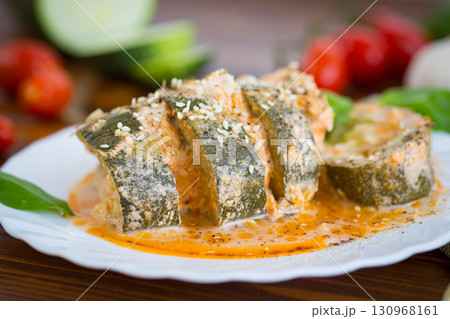 Vegetable dish of zucchini with spicy sauce and spices 130968161