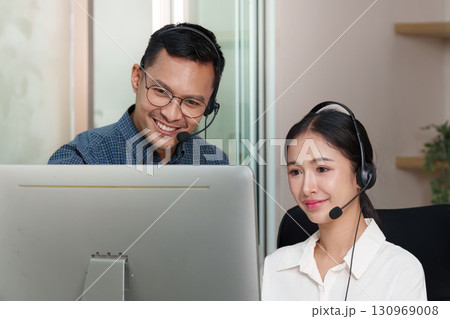 Call Center Agents Engaging in Customer Service Training 130969008