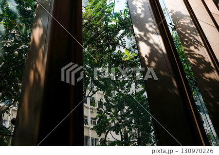 Looking from window with beautiful scene, city scene. Building structure. Looking from window with beautiful scene, city scene. Building structure. 130970226