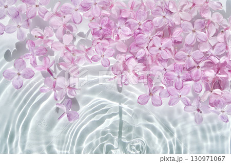 Abstract background with water and flowers. Space for the text. Abstract background with water and flowers. Space for the text. 130971067