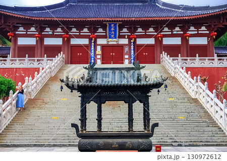 Hainan Island, Sanya: Nanshan Buddhist Center. View of the incense burner in front of the Temple Hainan Island, Sanya: Nanshan Buddhist Center. View of the incense burner in front of the Temple 130972612