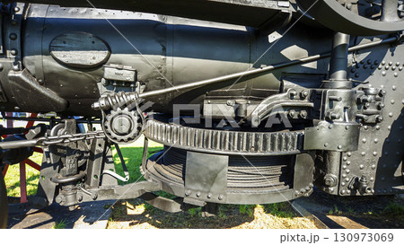 Nitra, Slovakia - September 4, 2025: A vintage locomotive on display at the Nitra Agricultural University. Close-up. Detail. 130973069