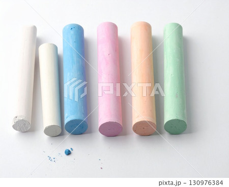 Colorful Chalk Sticks on White Background 130976384