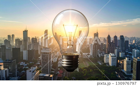light bulb with cityscape background 130976797