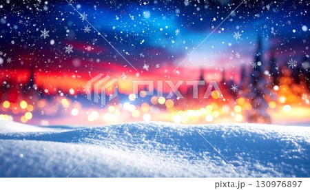 An abstract cosmos of twinkling stars and snowflakes glows brightly like a galaxy on a dark blue winter night An abstract cosmos of twinkling stars and snowflakes glows brightly like a galaxy on a dark blue winter night 130976897