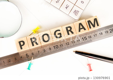 The concept word PROGRAM is assembled from wooden cubes on a white surface. Loyalty Program Shopping concept The concept word PROGRAM is assembled from wooden cubes on a white surface. Loyalty Program Shopping concept 130976901