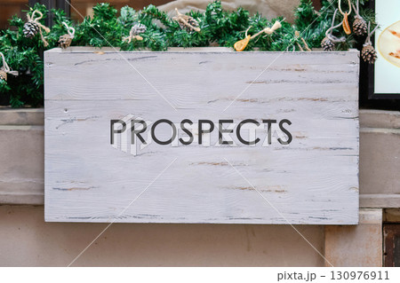 Lead Generation and converting them into Customers concept. Copy space. PROSPECTS written on A blank wooden sign 130976911