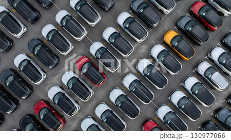 Aerial view car for sale stock lot row, Cars dealership inventory distribution automobile and automotive business, New cars parking for sale automobile automotive industry business. Aerial view car for sale stock lot row, Cars dealership inventory distribution automobile and automotive business, New cars parking for sale automobile automotive industry business. 130977066