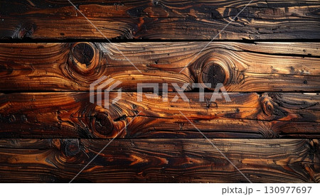 Old weathered brown wooden board surface with natural grain and a rough texture 130977697