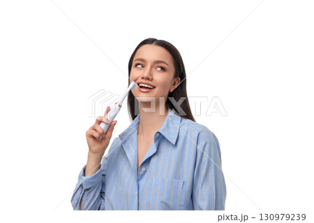 Smiling woman cleans teeth with toothbrush, isolated, PNG Smiling woman cleans teeth with toothbrush, isolated, PNG 130979239