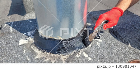 Roof Maintenance Sealing the Pipe Base to Enhance Durability and Longevity of Your Roof Roof Maintenance Sealing the Pipe Base to Enhance Durability and Longevity of Your Roof 130981047