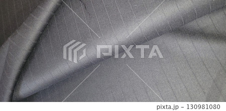 A Stunning and Beautiful CloseUp of Black Textured Fabric for Use in Fashion and Design Projects A Stunning and Beautiful CloseUp of Black Textured Fabric for Use in Fashion and Design Projects 130981080