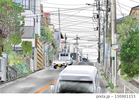 車が走る道路と住宅街 130981153