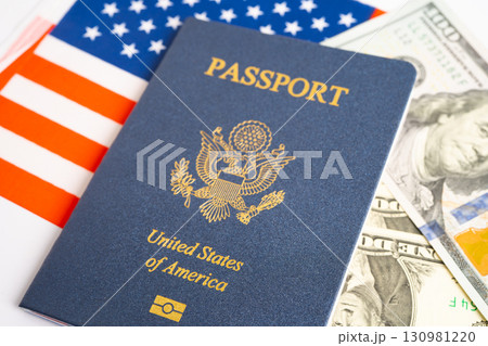 US passport issued to citizen and national of the United States of America to travel in most countries outside with USA flag and dollar money. 130981220